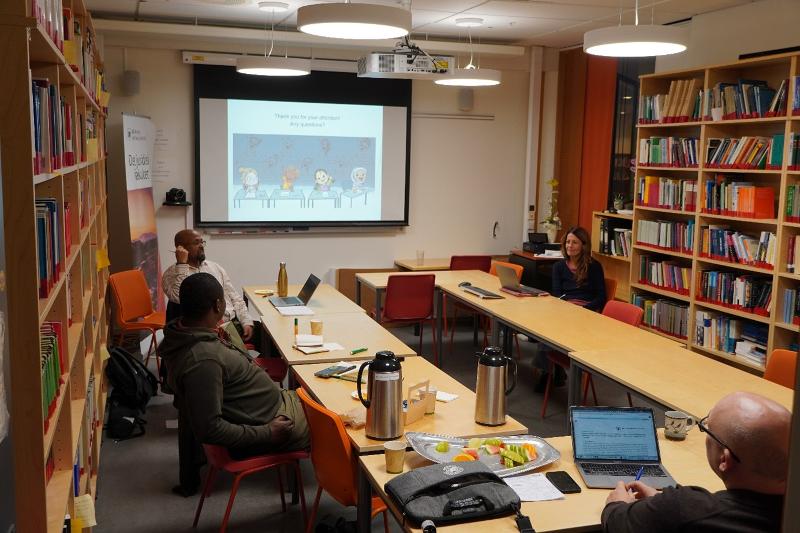 The group is discussing the workshop after the presentations